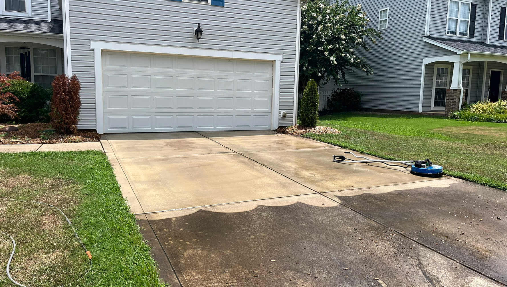 driveway-getting-cleaned driveway-pressure-washing-charlotte-nc