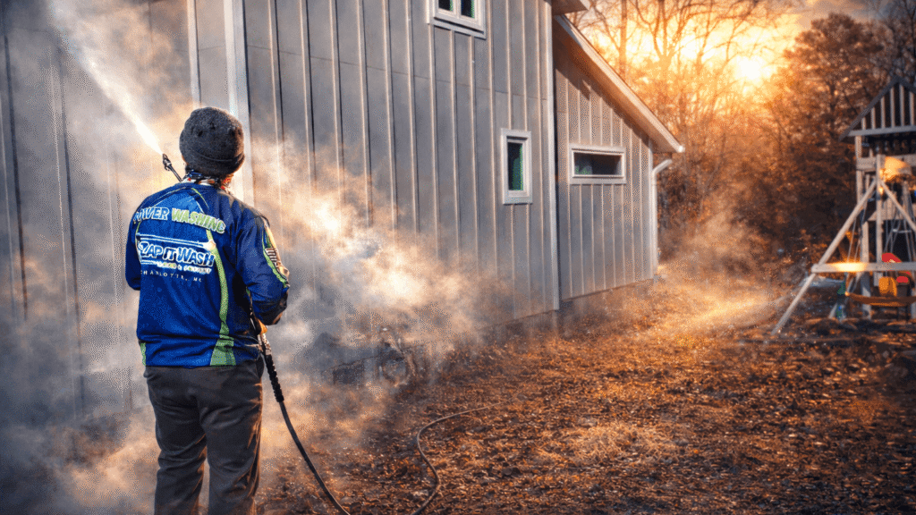 A residential home getting power washed in Charlotte.